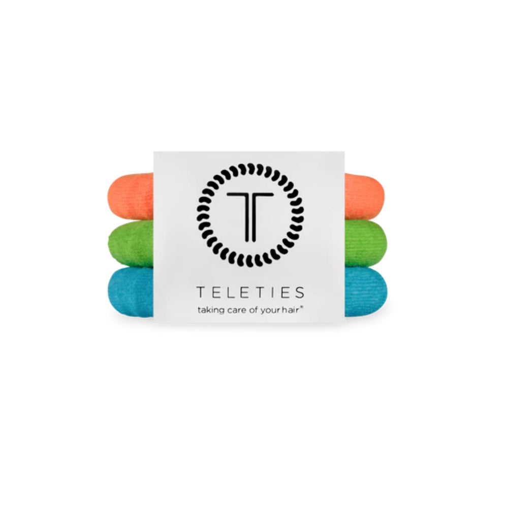 Pack of colorful hair ties with Teleties packaging on a white background