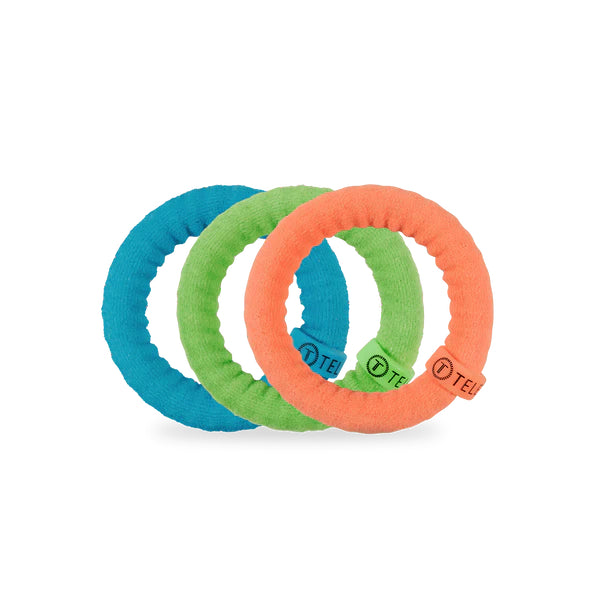 Three colorful rubber rings on a white background