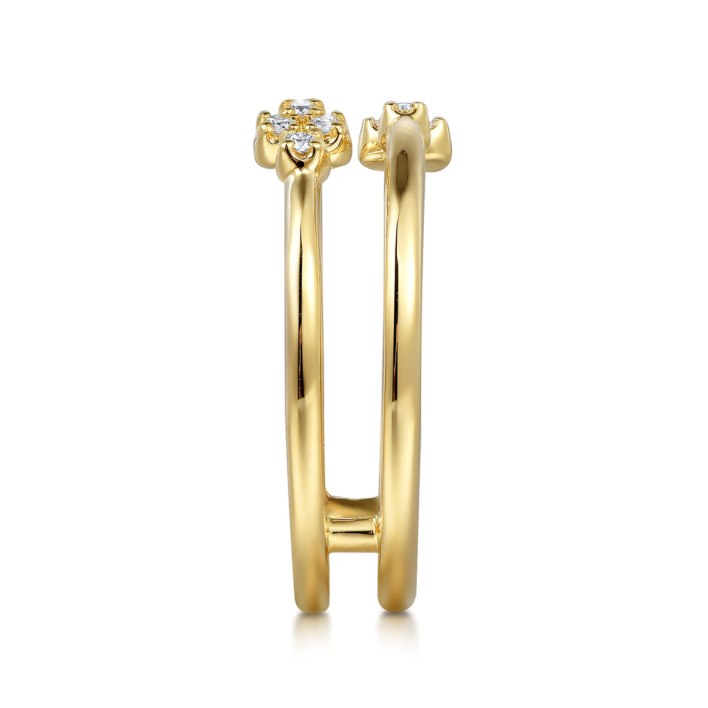 double row gold ring with diamonds on white background from side
