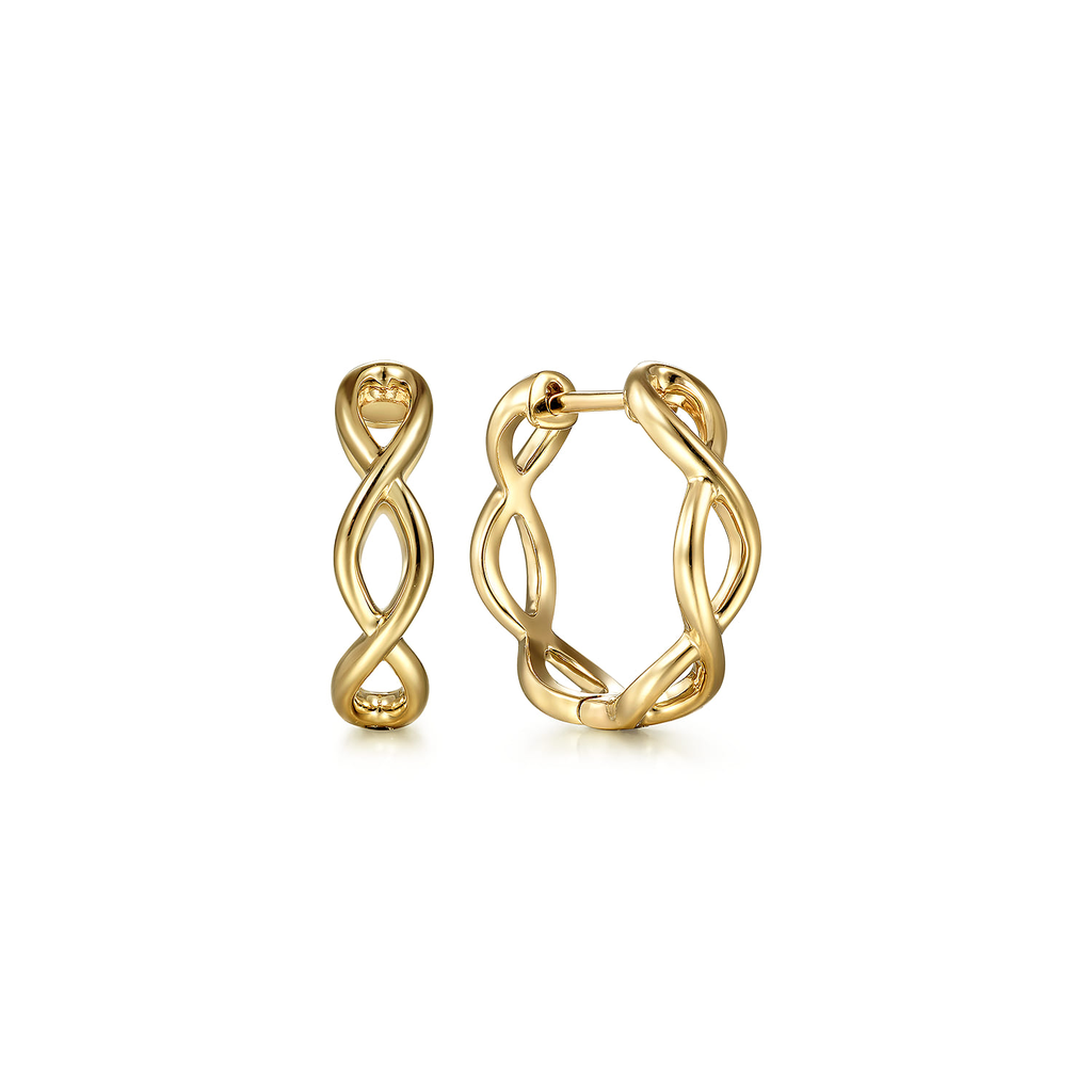 Gold hoop earrings on a white background