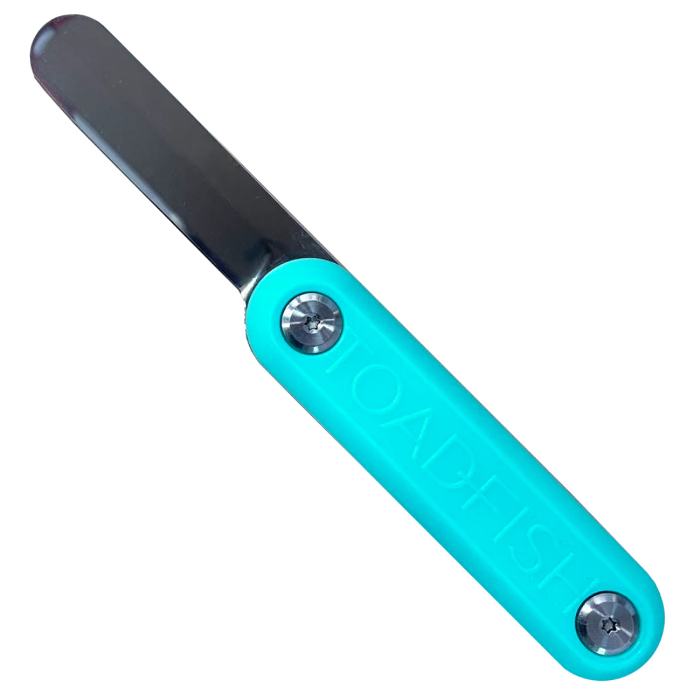 Turquoise clam knife with a black metallic blade on a white background.