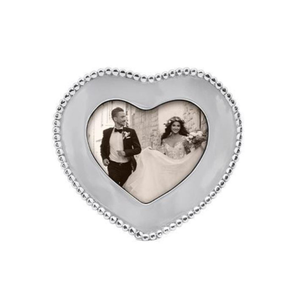 Heart-shaped beaded 4x6 photo frame with a couple's picture inside on a white background
