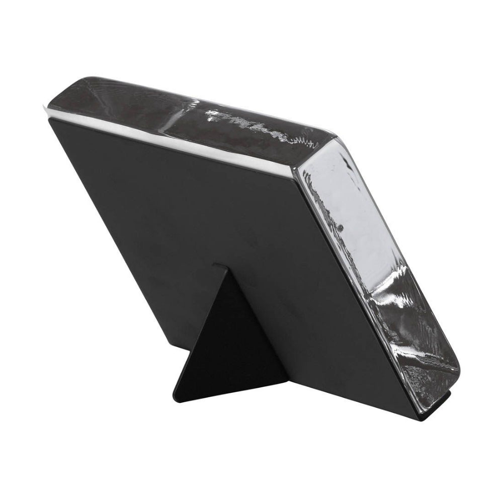 An angled side photo of the back of the Simon Pearce Woodbury Square Photo Block on a white backround.