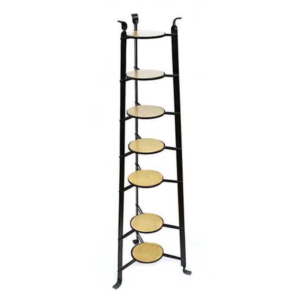 Black metal shelf with round wooden platforms on a white background