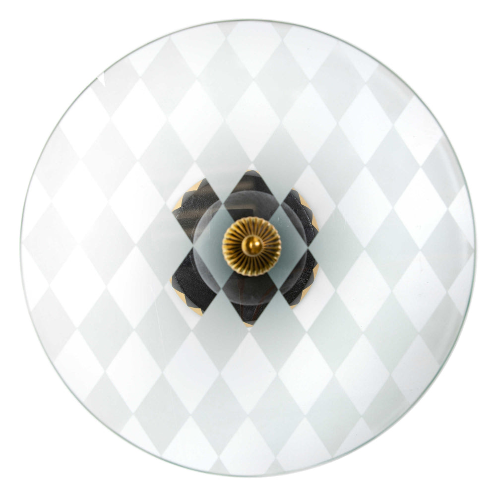 Top of MacKenzie-Childs Gambit Accent Table on white backround