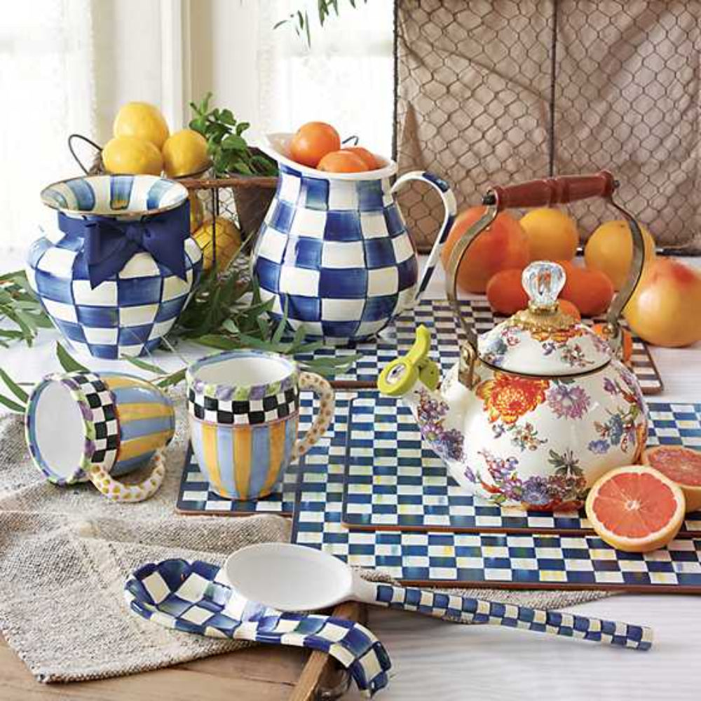 MacKenzie-Childs royal check cork back placemats on a table with other royal check and simular items