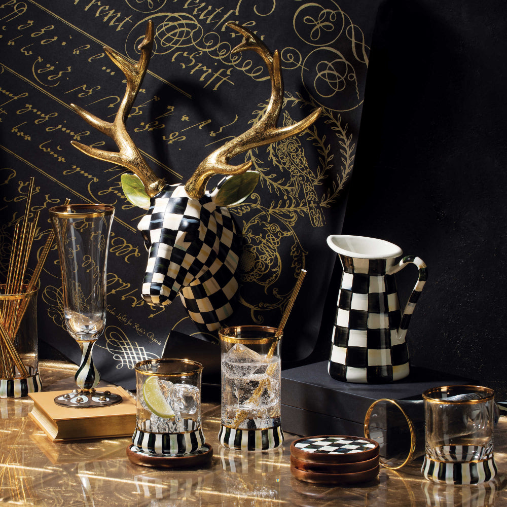 Courtly Check decor pieces on dark background