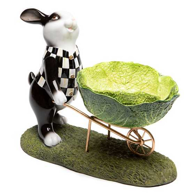 A decorative garden bunny cart with hand-painted Courtly Check pattern, featuring a bunny standing next to a cart with a cabbage leaf-shaped bowl on top, on a grass-like base.