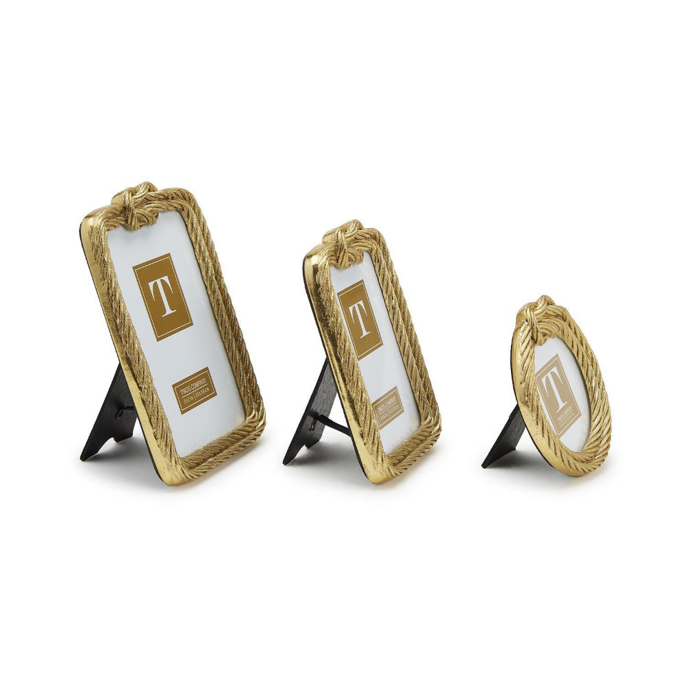 The side of three decorative picture frames with gold rope detailing on a white background.