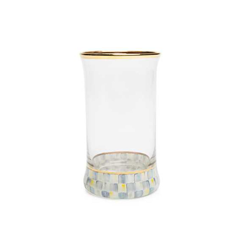 Clear glass vase with gold rim and sterling check patterned base on a white background