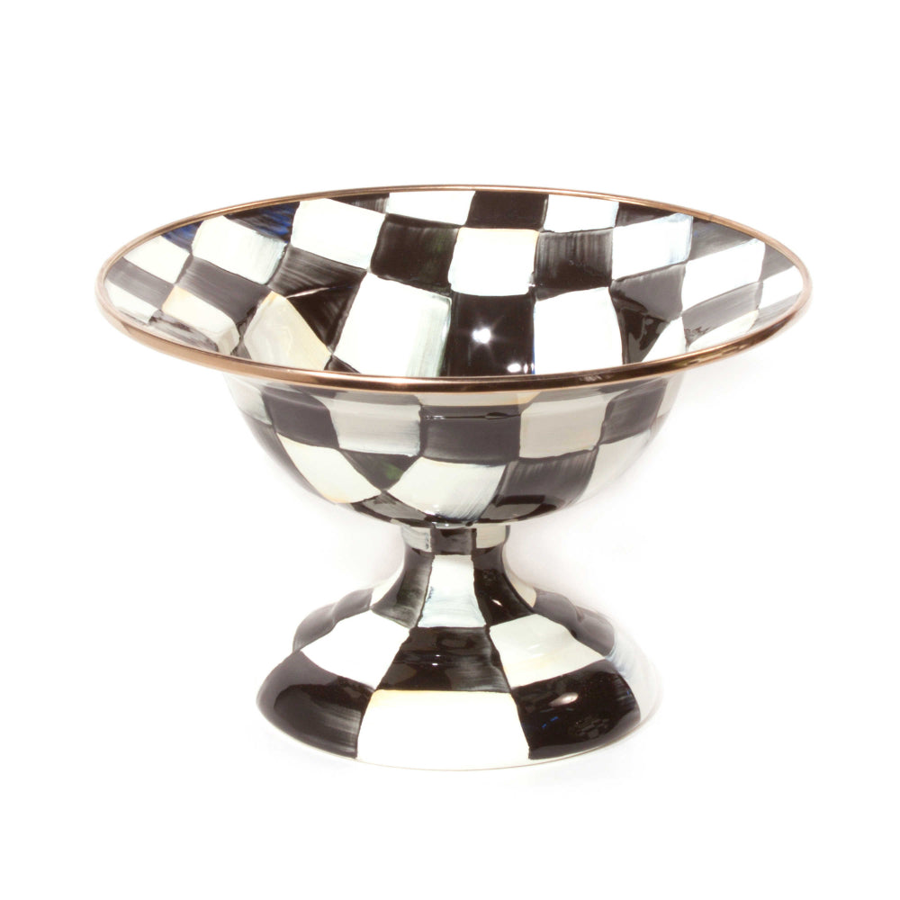 Small black and white checkered bowl with gold rims on a white background