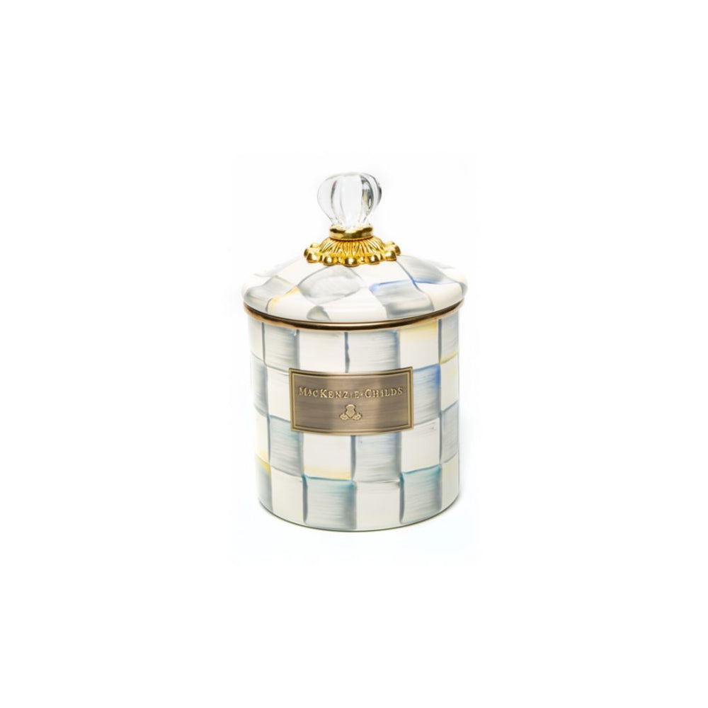 Small sterling check canister on white background