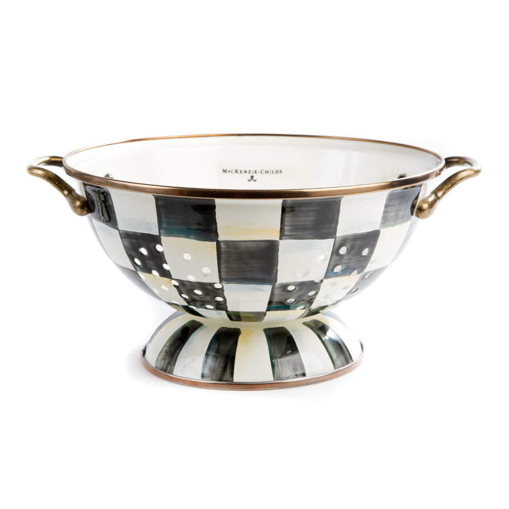 Black & White Checkered colander with gold handles on a white background.