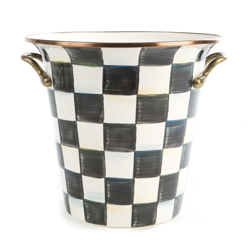 A hand-painted, glossy, black and white checkered enamel wine cooler with bronzed stainless steel rim and handles.