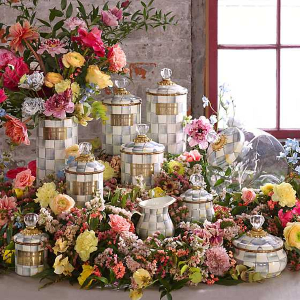 Collection of Sterling Check Canisters in floral design and background