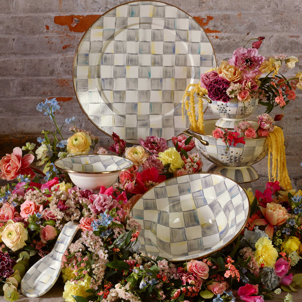 Sterling Check pieces on floral display 
