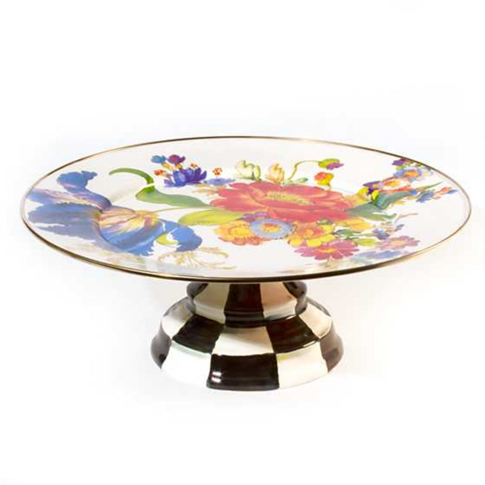 Large decorative cake stand with a colorful floral design on a white background