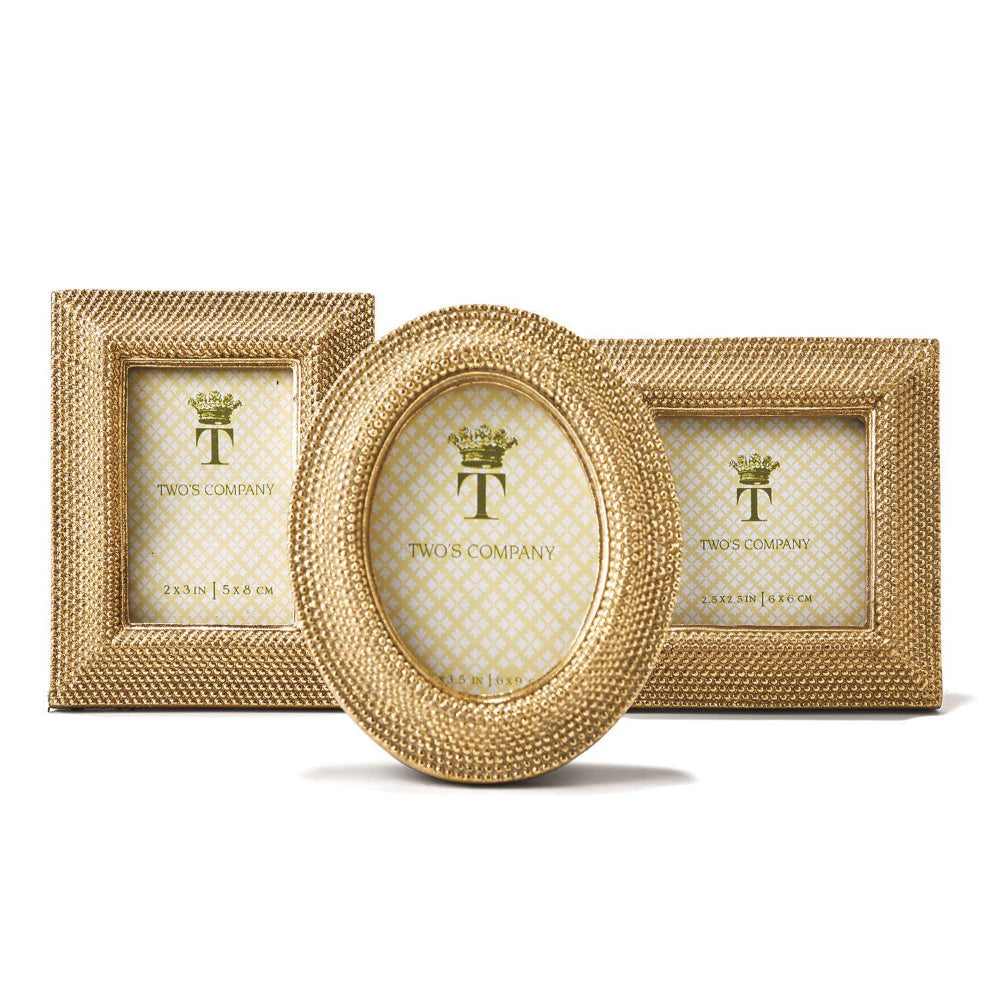 Three gold photo frames and three shapes, oval,rectangle & square  with 'TWO'S COMPANY' branding on a white background.