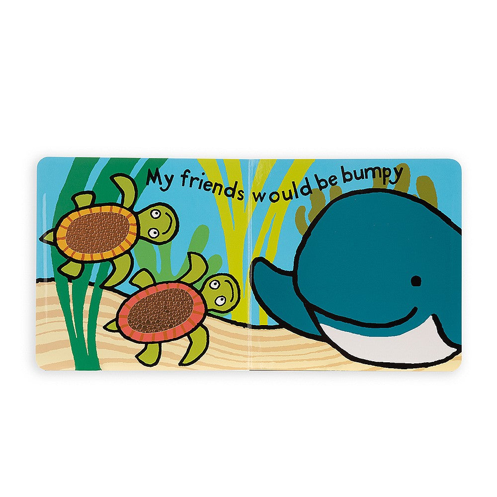 Children's book with a whale illustration and text on light blue background.