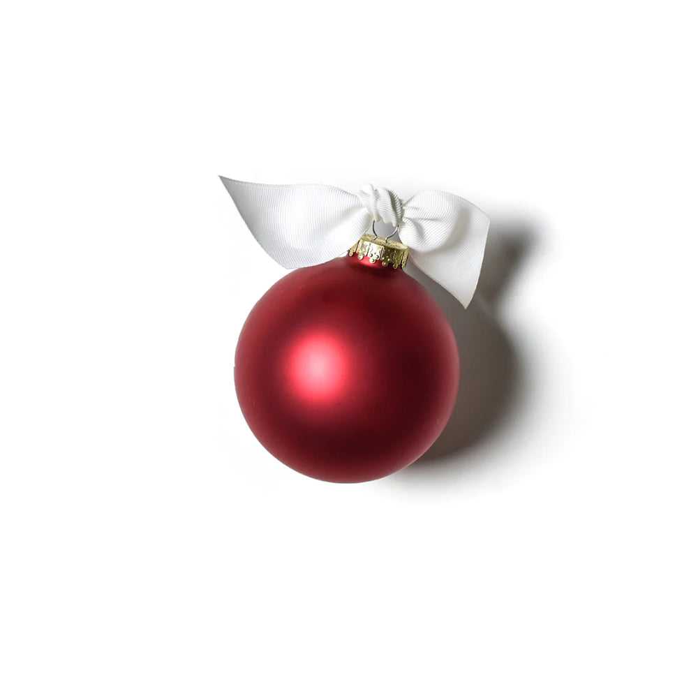 back side of God Bless America ornament, all red with white tied bow on top. 