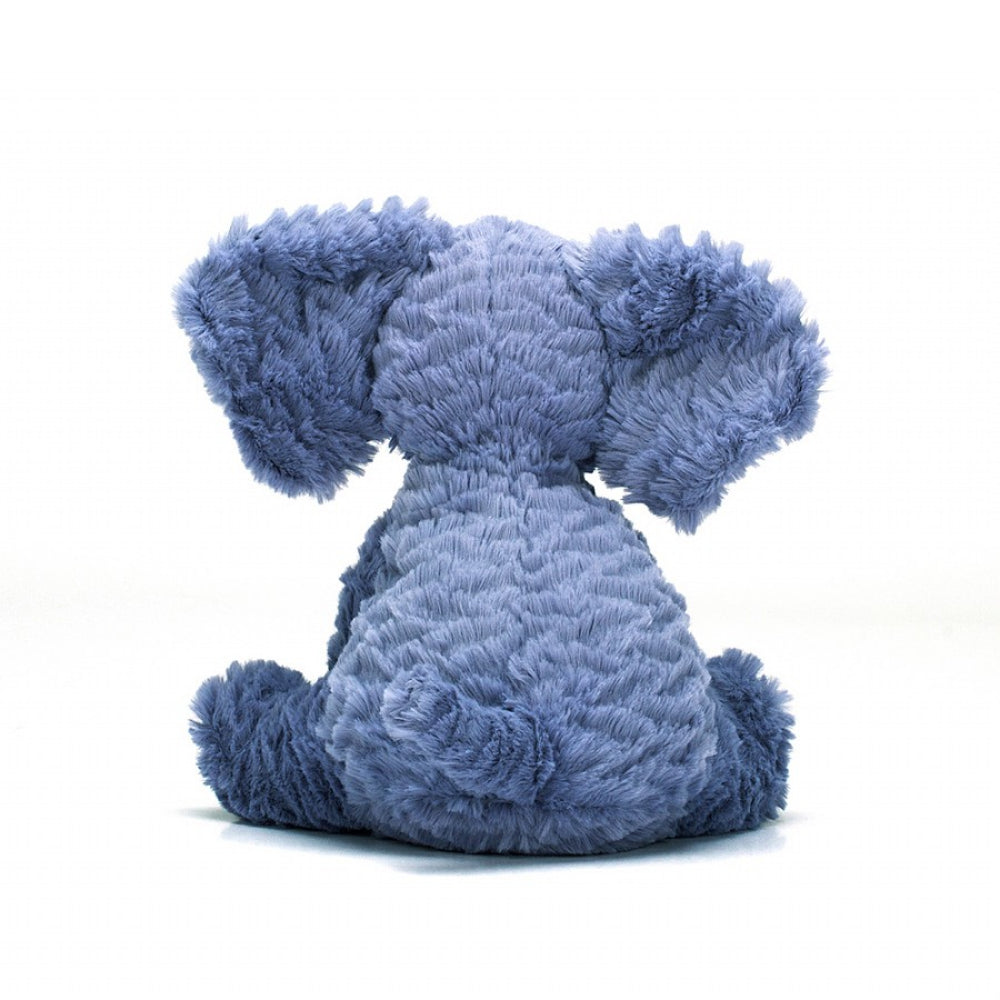Back of a blue plush elephant toy on a white background