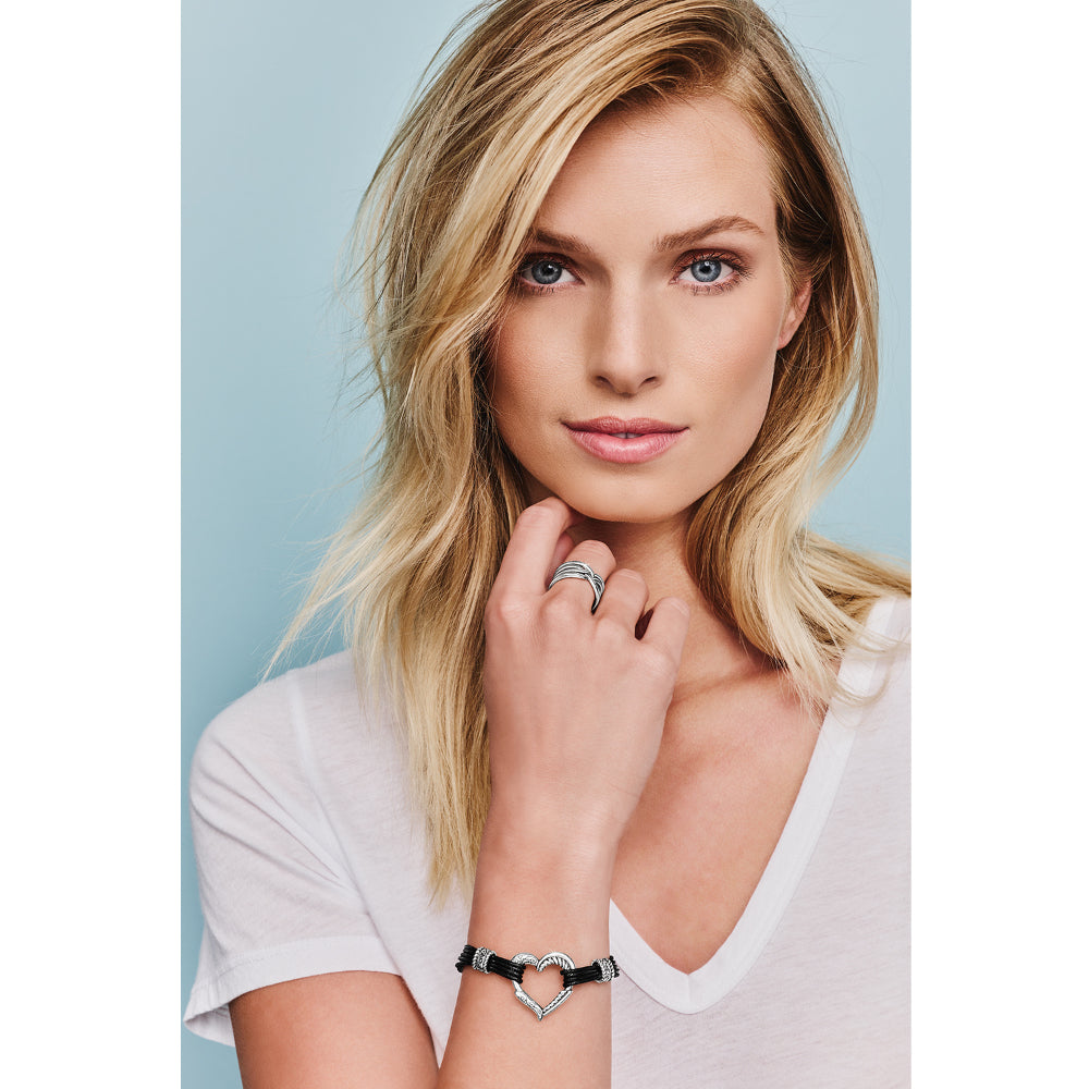 black and silver bracelet on model