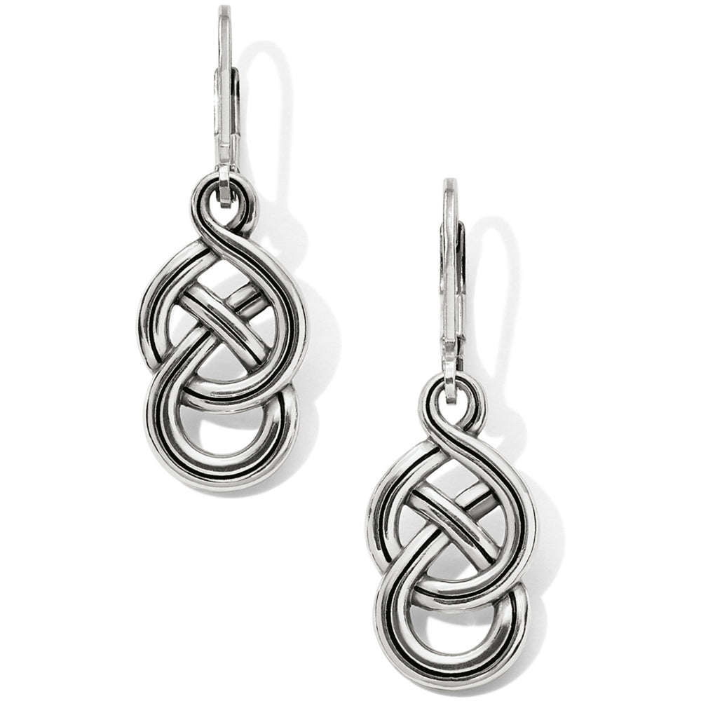 Pair of silver knot earrings on a white background