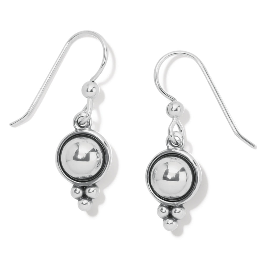 Silver earrings on white background