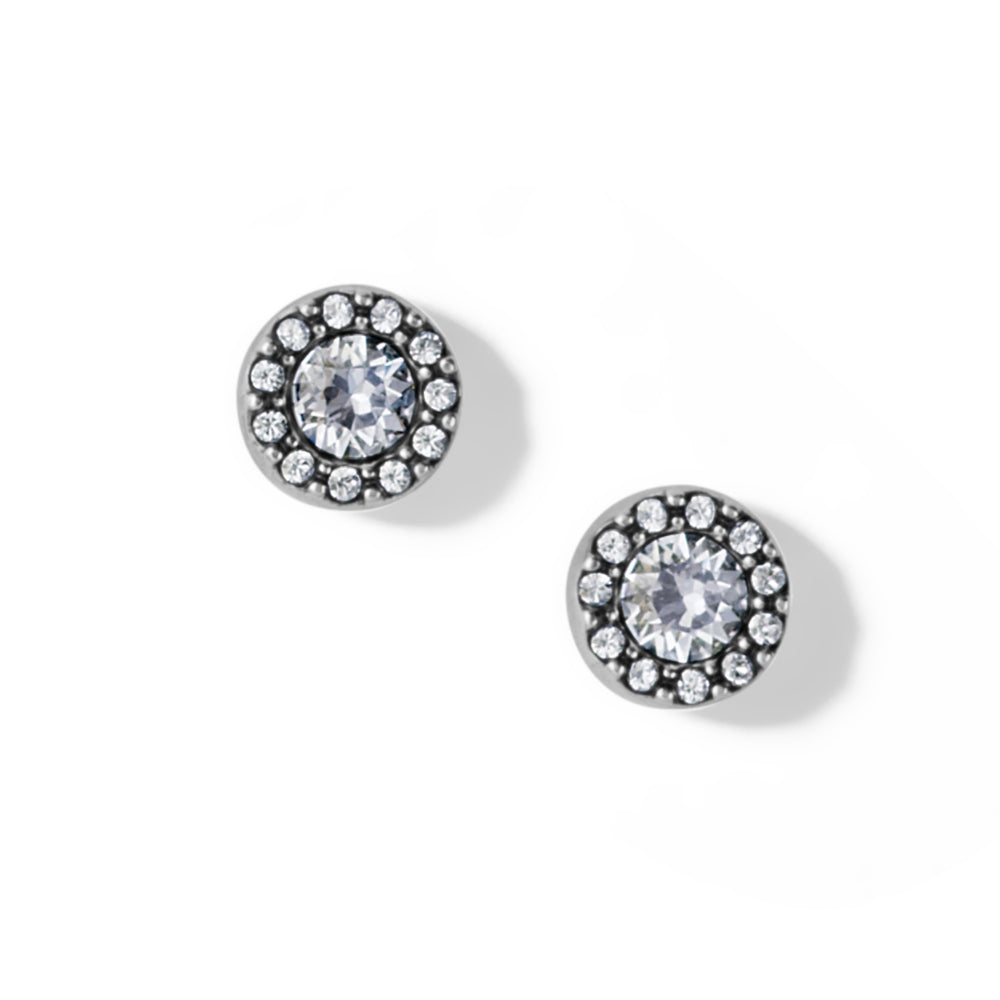Pair of round crystal stud earrings on a white background