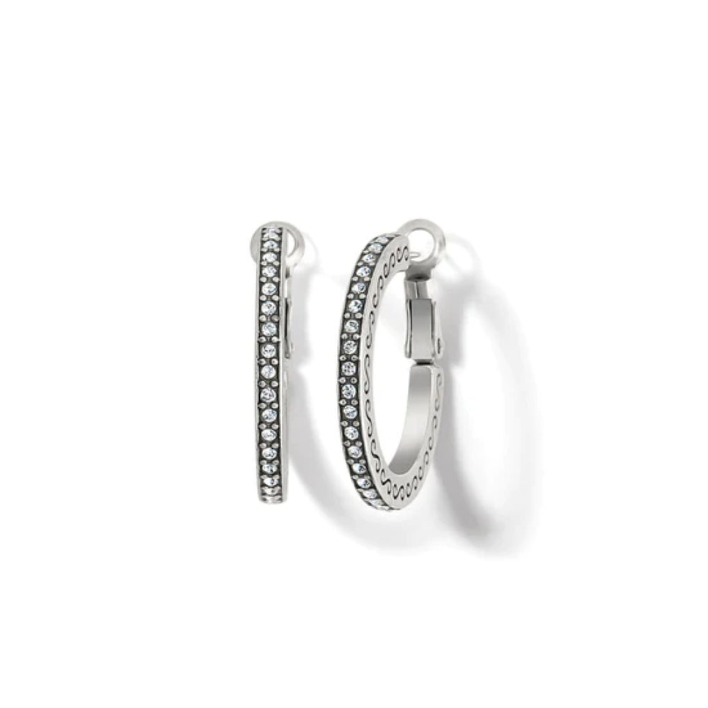 Pair of silver hoop earrings with embedded stones on a white background